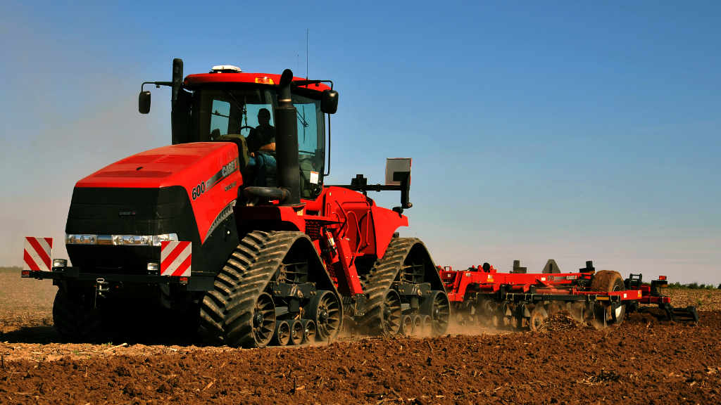 A Case Steiger Series 600 Quadtrac tractor, pulling an Ecolo-Tiger 870 disk ripper.